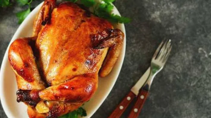 Курица, запеченная с лимоном и чесноком: рецепт блюда на выходные